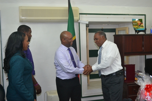 Sean Latty Chief Executive Officer (CEO) of Digicel (St. Kitts-Nevis) Ltd. and his team - Digicel Play Employee of the Month Juan Christmas and Jacinth Welsh Business Sales Manager for Digicel (St. Kitts-Nevis) Ltd. presenting a Digicel gift package to Premier of Nevis Hon. Vance Amory at his Bath Hotel office on March 09, 2016